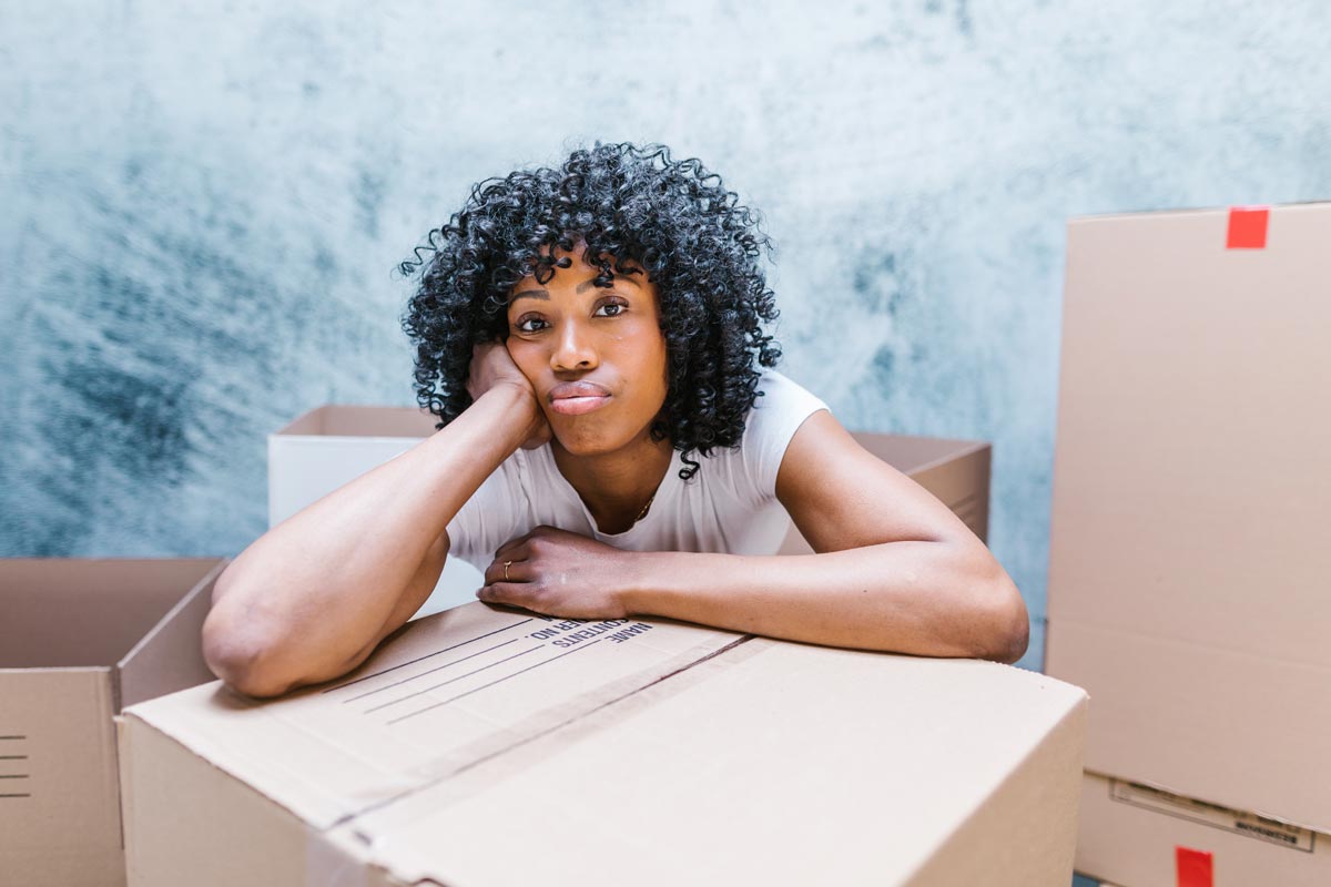 Girl waiting with box 